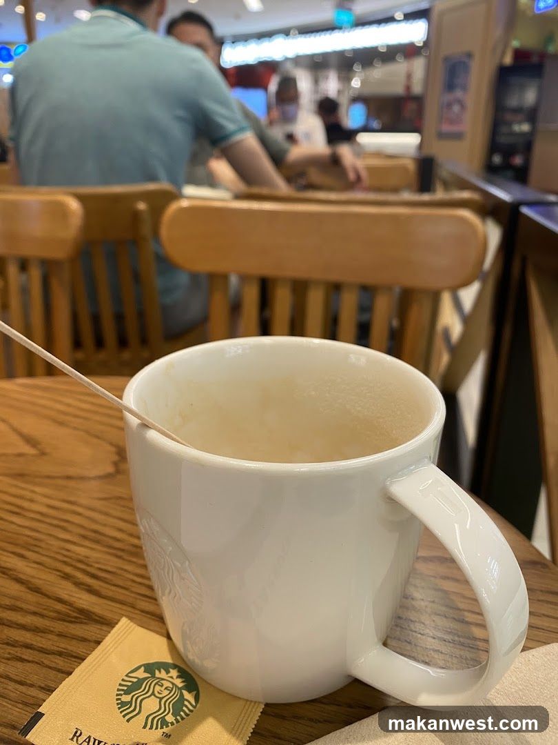 Starbucks Coffee Cup in Cafe Interior