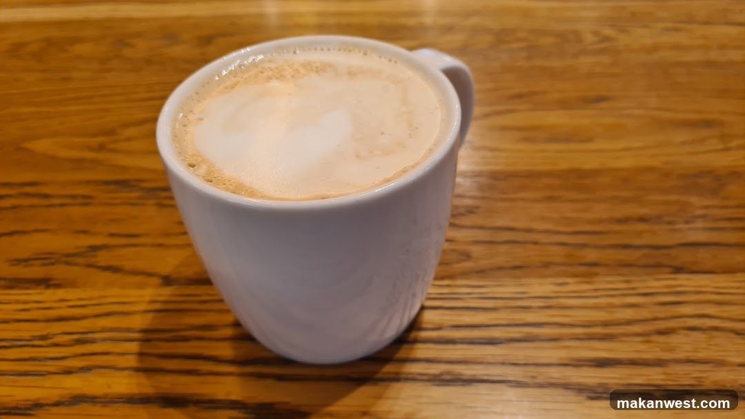 Cup of coffee on wooden table
