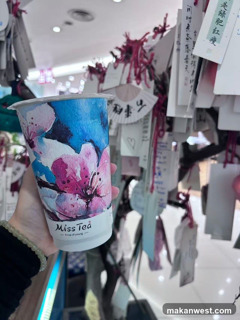 Miss Tea Cup with Cherry Blossom Design