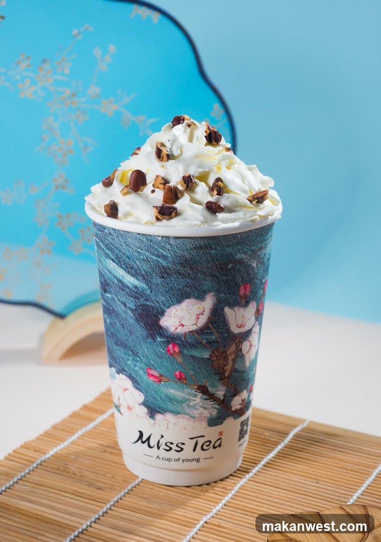 Miss Tea Cup with Whipped Cream and Nuts
