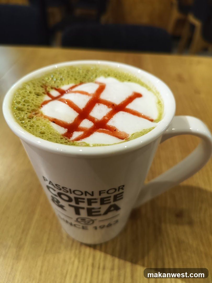 Matcha Latte with Red Drizzle