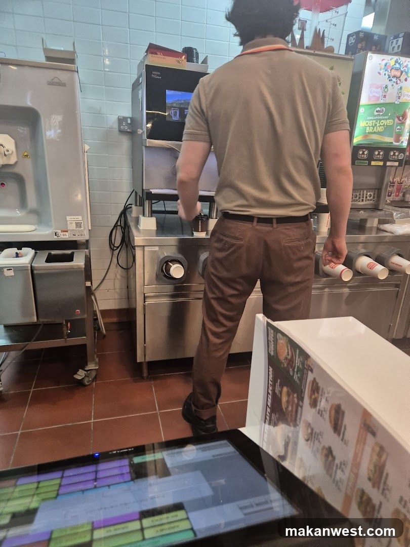 Staff preparing food in kitchen area