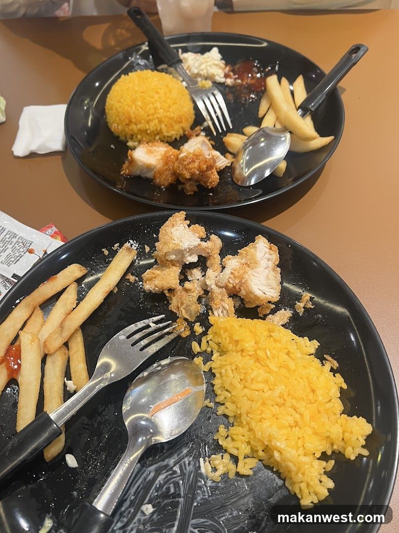Eaten Meal with Fried Chicken and Rice