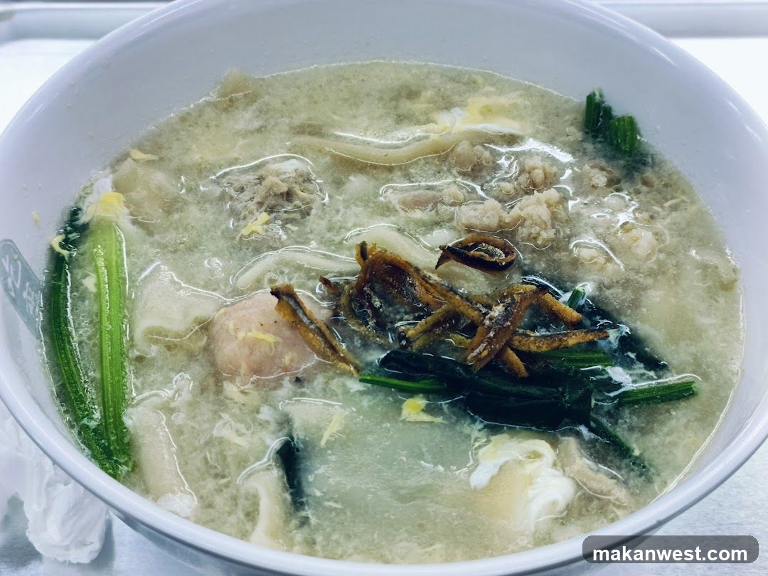 Bowl of Soup with Tofu and Greens