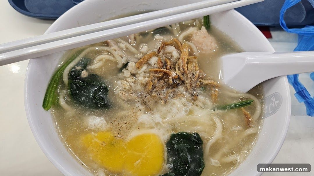 Bowl of Noodle Soup with Egg and Tofu Skin