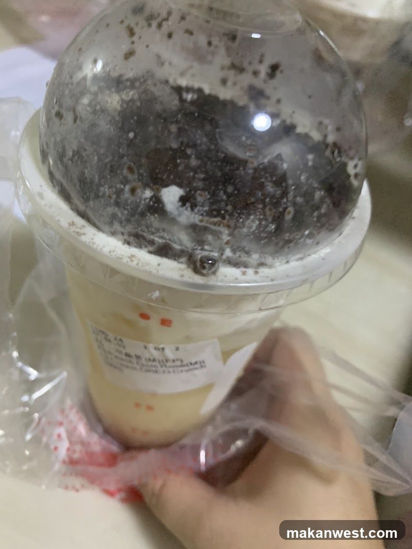 Beverage Cup with Ice and Condensation