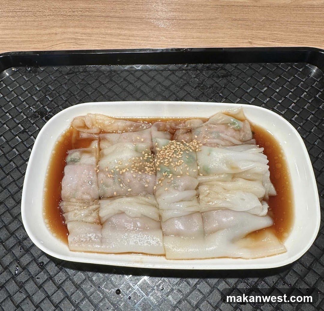 Steamed Rice Rolls with Sauce and Sesame Seeds