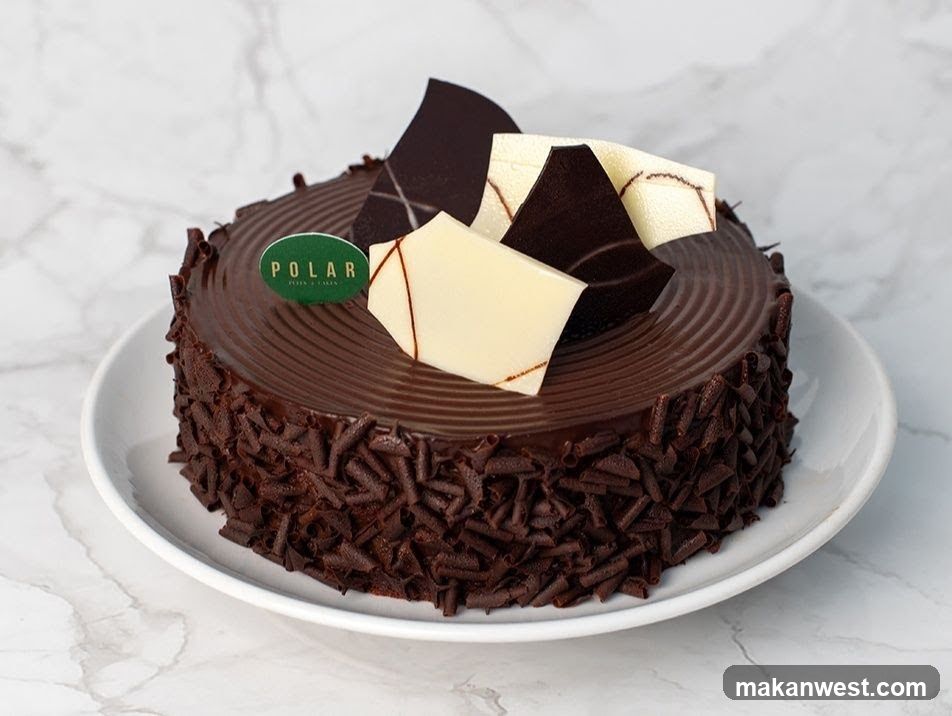 Chocolate Cake with White Chocolate Decorations