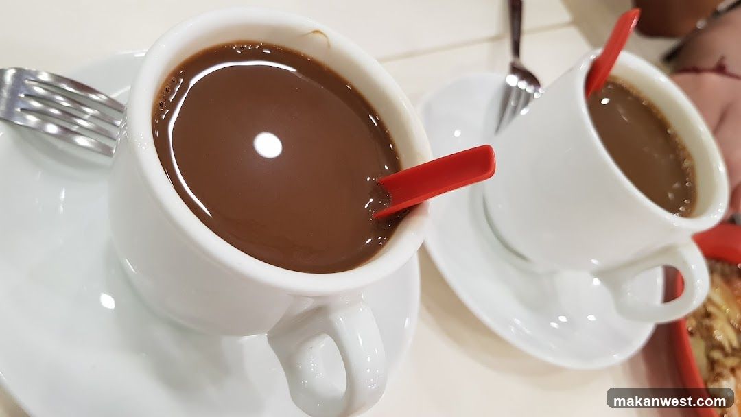 Coffee Cups with Red Stirrers