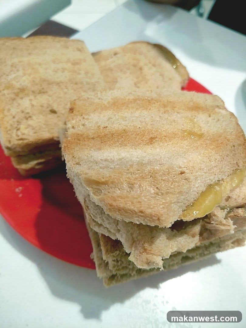 Grilled Sandwich on Red Plate