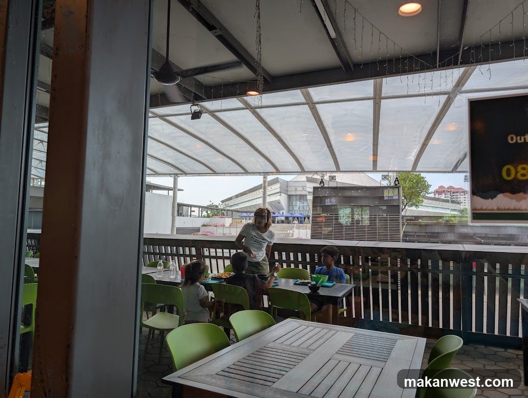 Outdoor Dining Area with Children