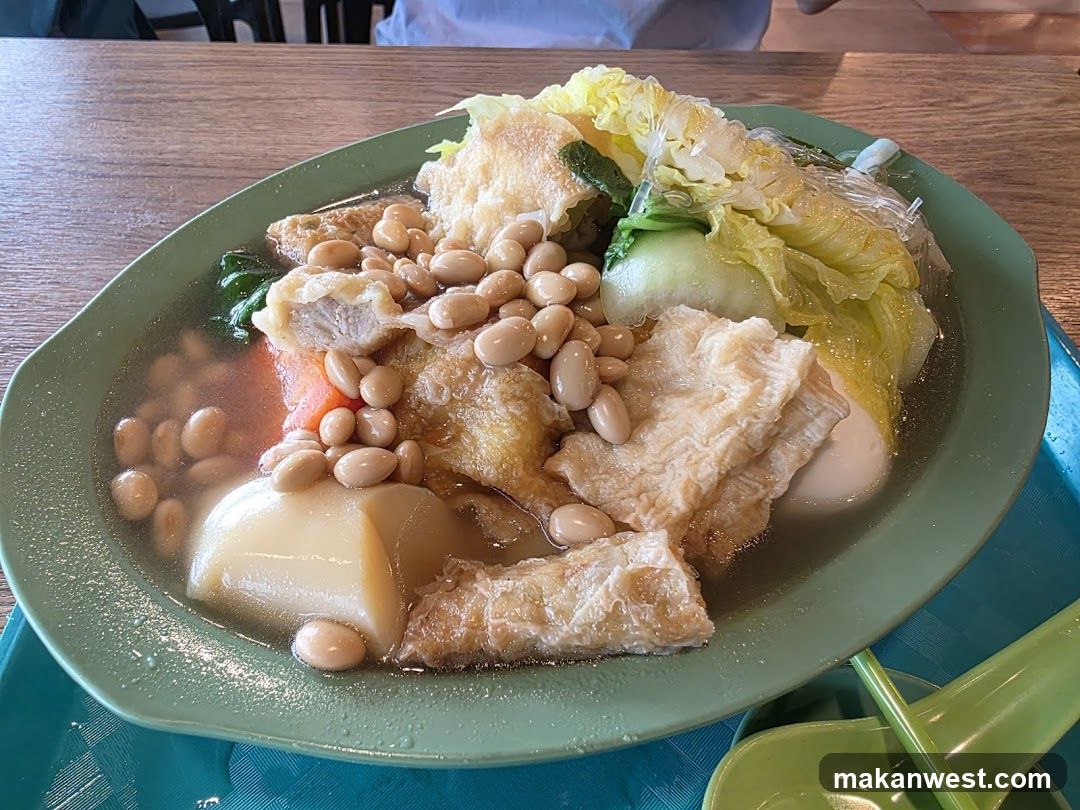 Bowl of Soybean Soup with Vegetables and Tofu
