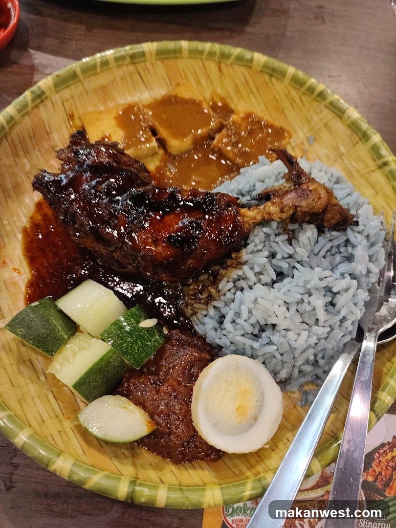Bowl of Blue Rice with Chicken and Sides