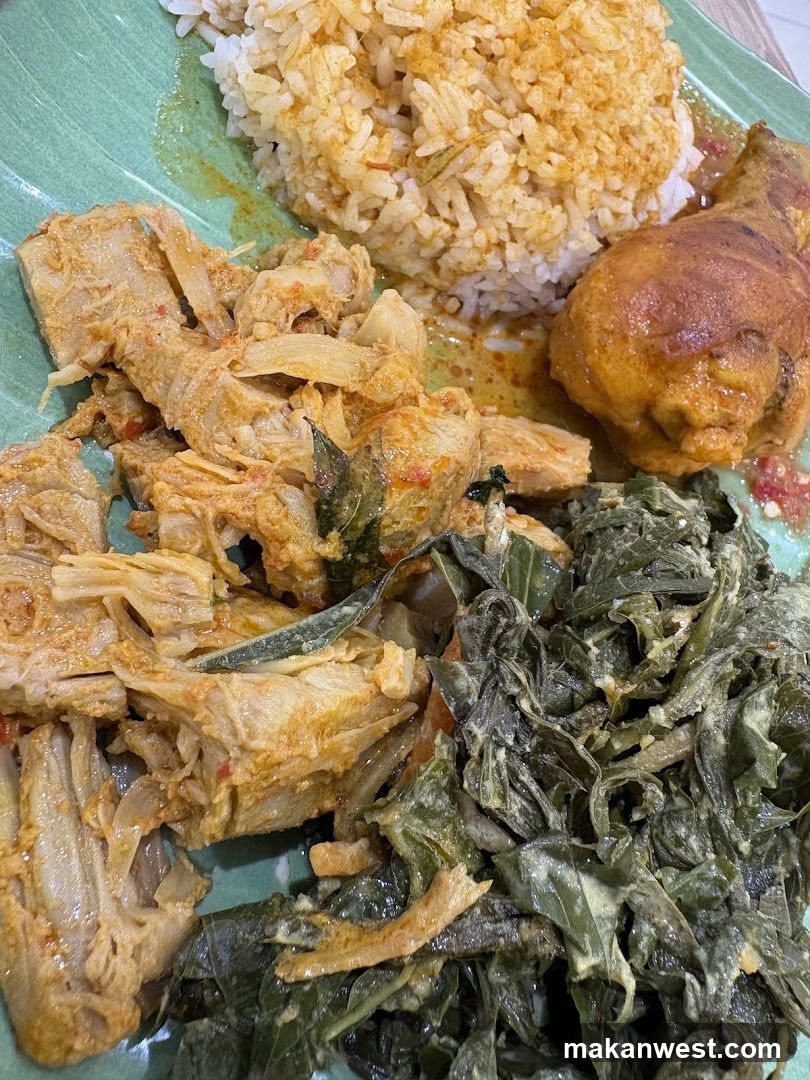 Plate of Chicken and Rice with Greens