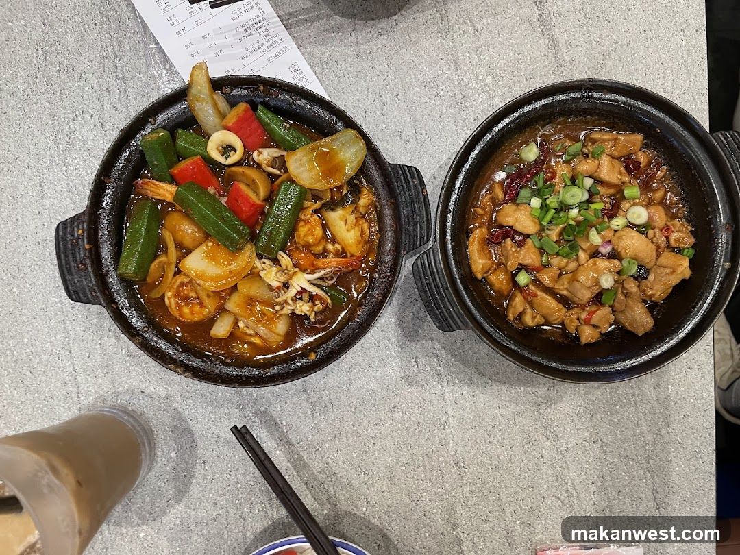 Two Clay Pot Dishes on a Table