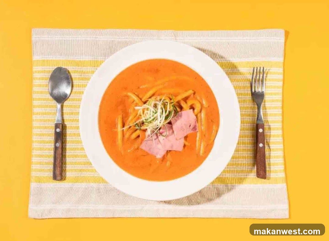 Creamy Pasta Dish with Ham and Greens