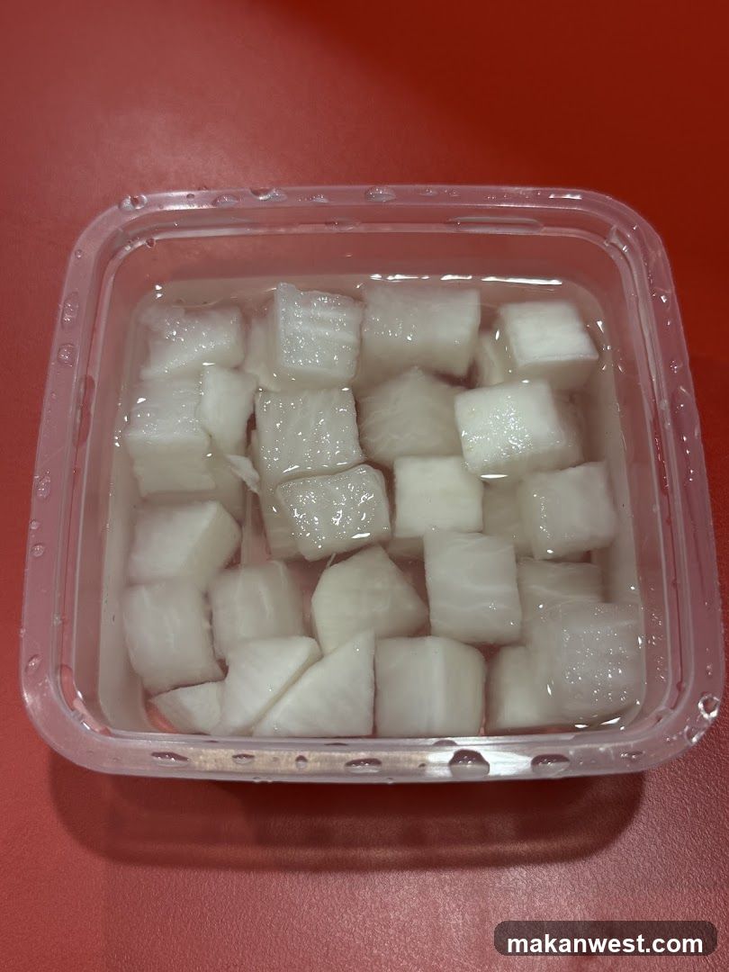 Diced White Root Vegetable in Container
