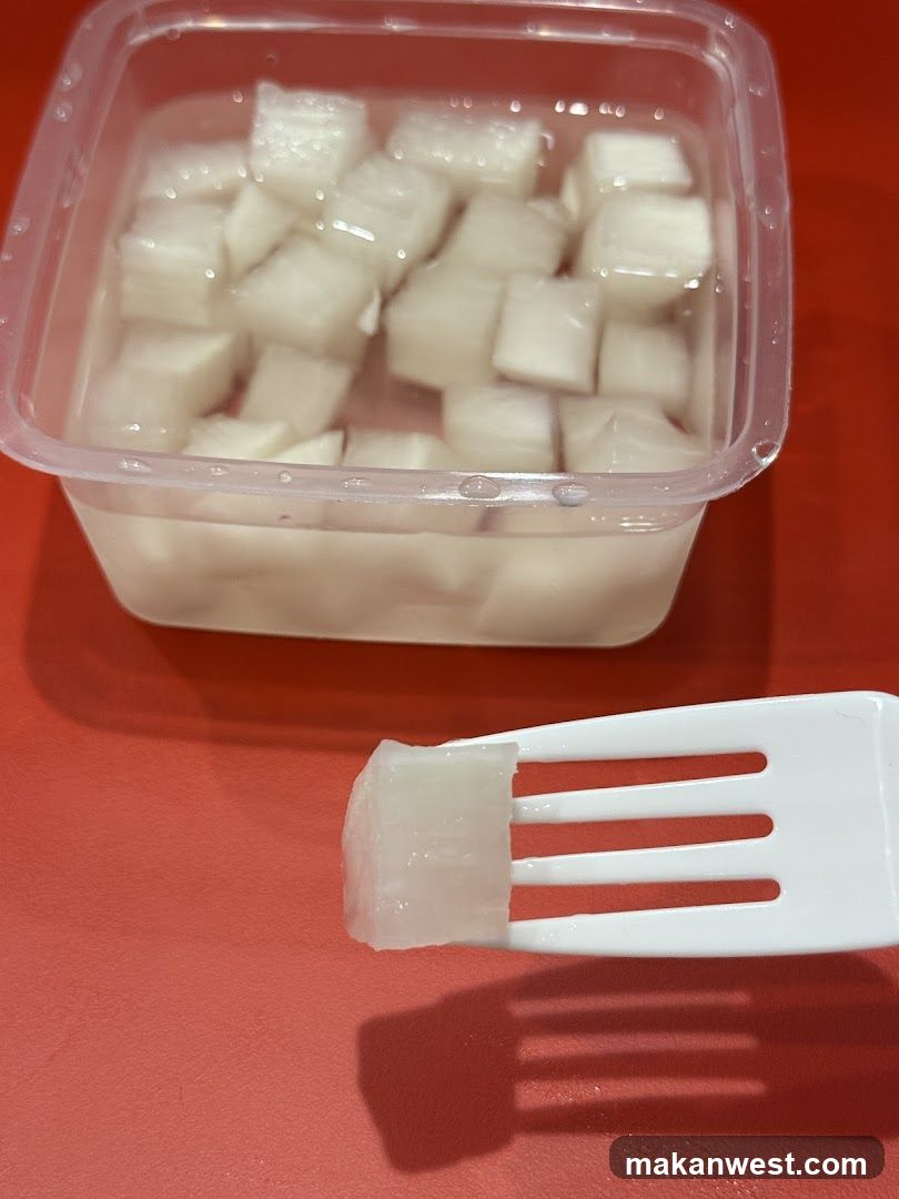 Diced White Cube Food in Container