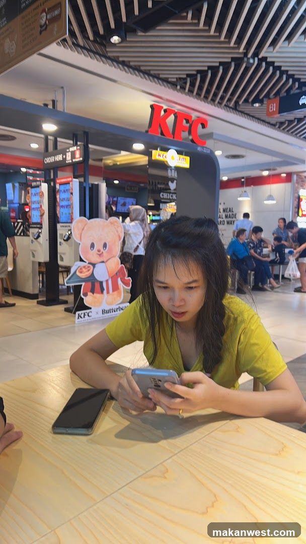 Person at KFC Table