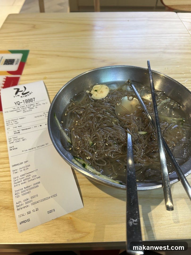 Serving of Korean glass noodles with receipt