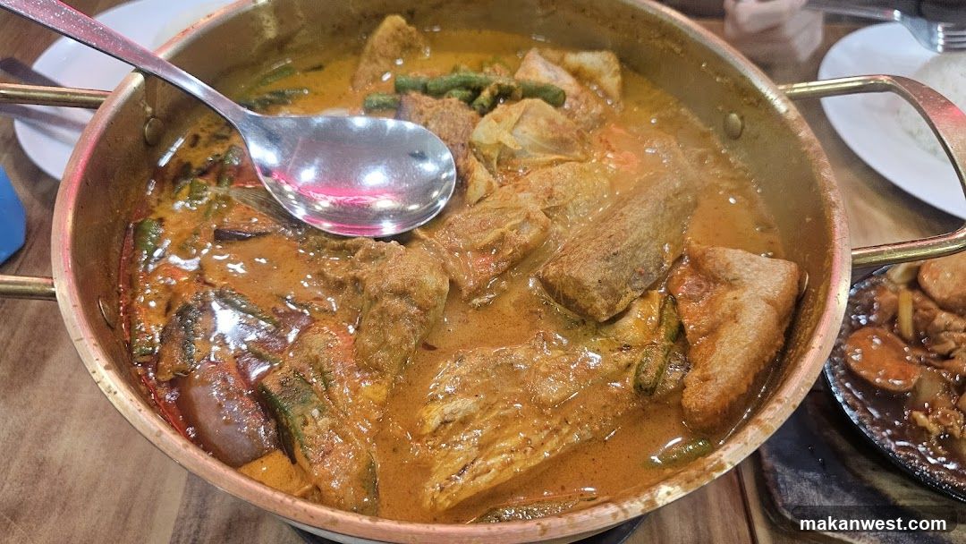 Curry Dish in Copper Pot