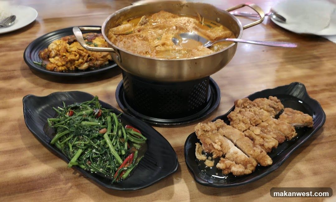 Dining Table with Hot Pot and Side Dishes