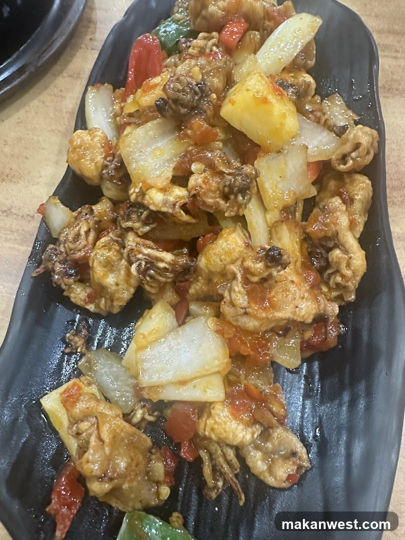 Stir-fried Chicken with Onions and Peppers