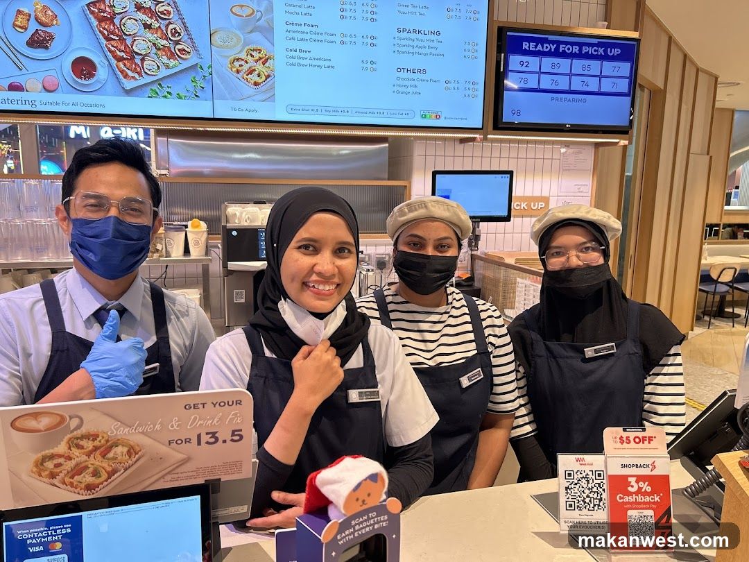 Staff at a food counter