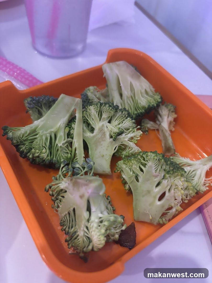 Broccoli on Orange Plate