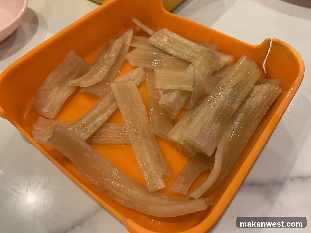 Orange tray with sliced food items