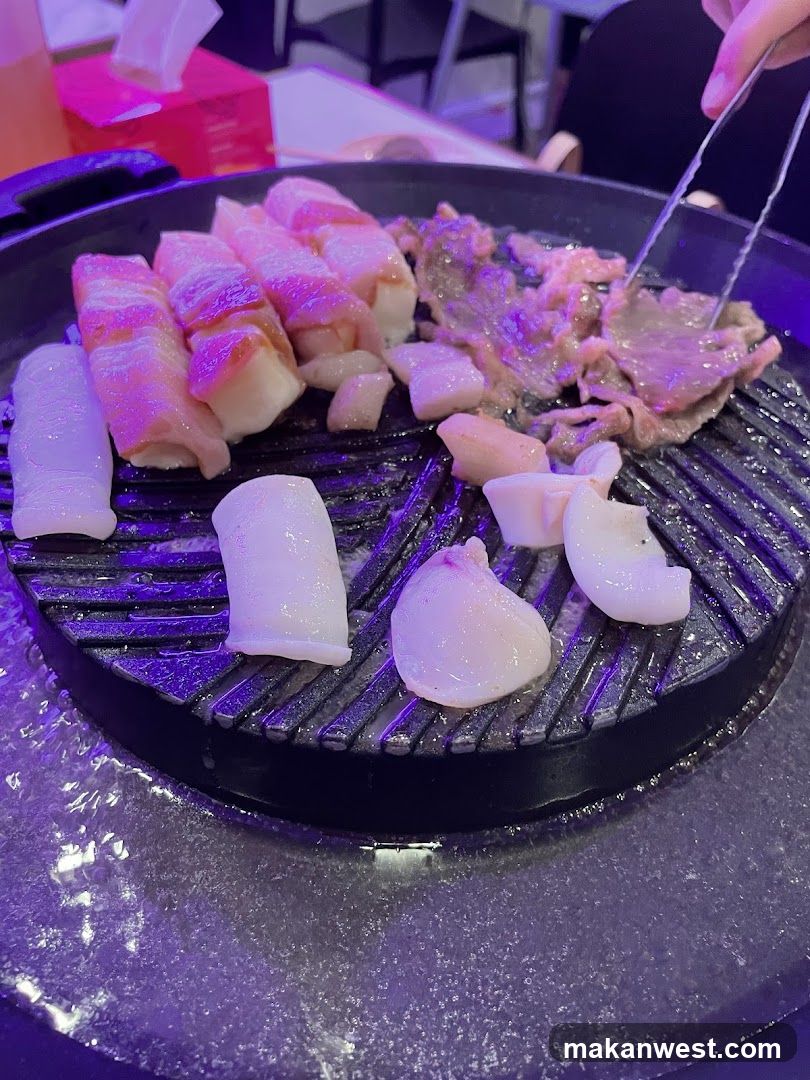 Grilled Meat and Seafood on a Hot Plate