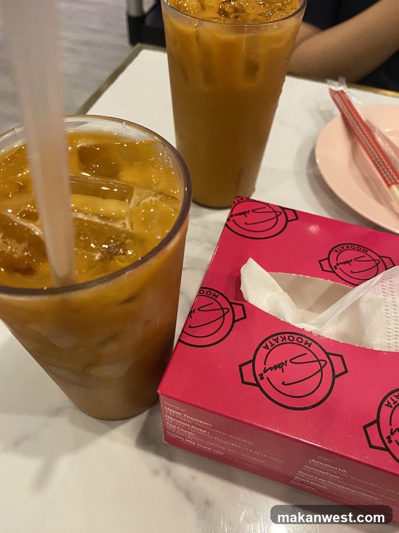 Iced Coffee Drinks and Tissue Box