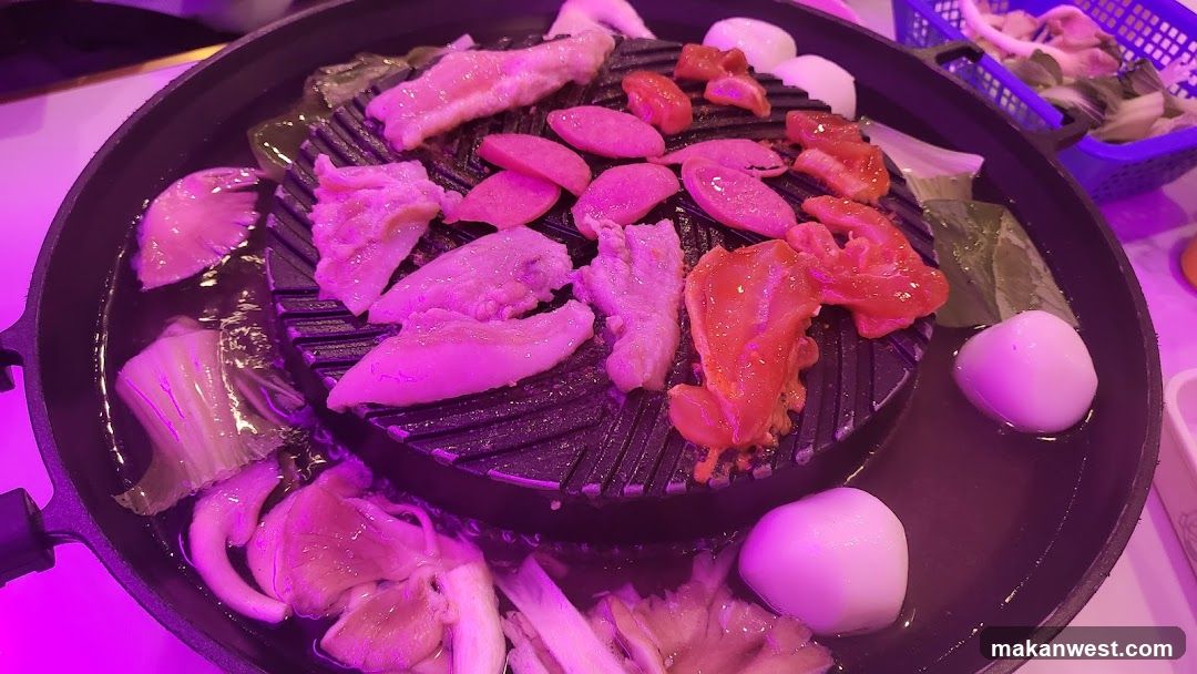 Grilled Meat and Vegetables on a Hot Pot