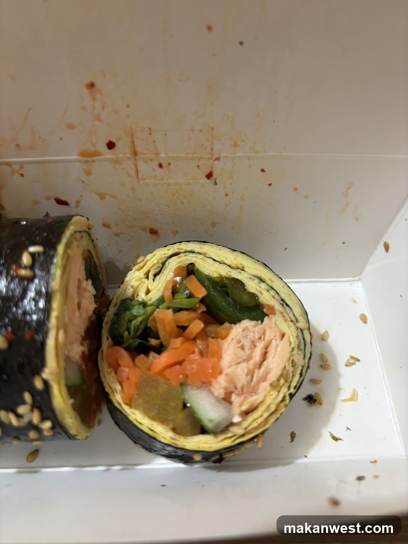 Sushi Roll in Takeout Box