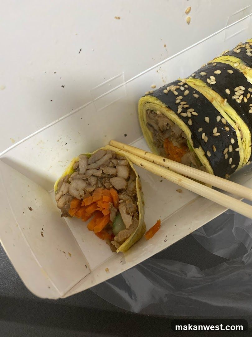 Sushi Roll in Takeout Box