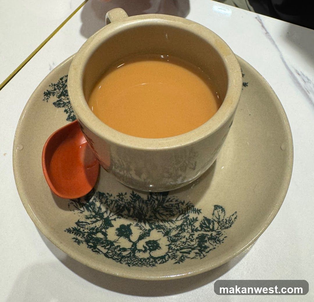 Cup of Milk Tea with Spoon