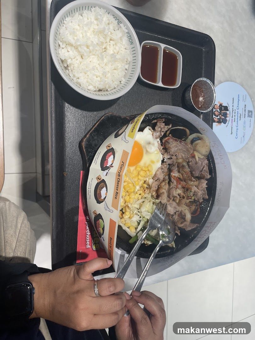 Bento Box Meal with Rice and Sides