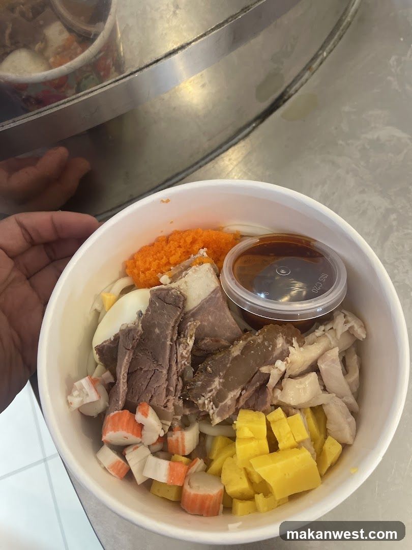Bowl of Mixed Meat and Seafood with Sauce