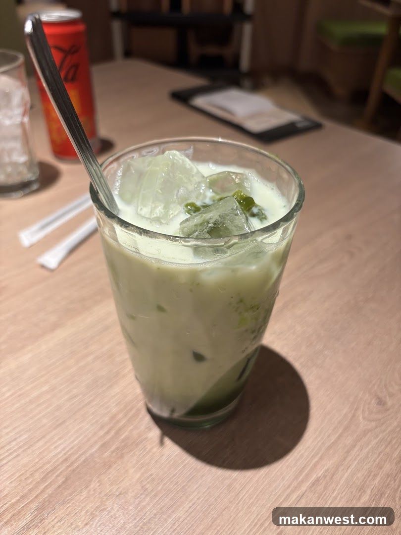 Matcha Latte with Ice and Straw