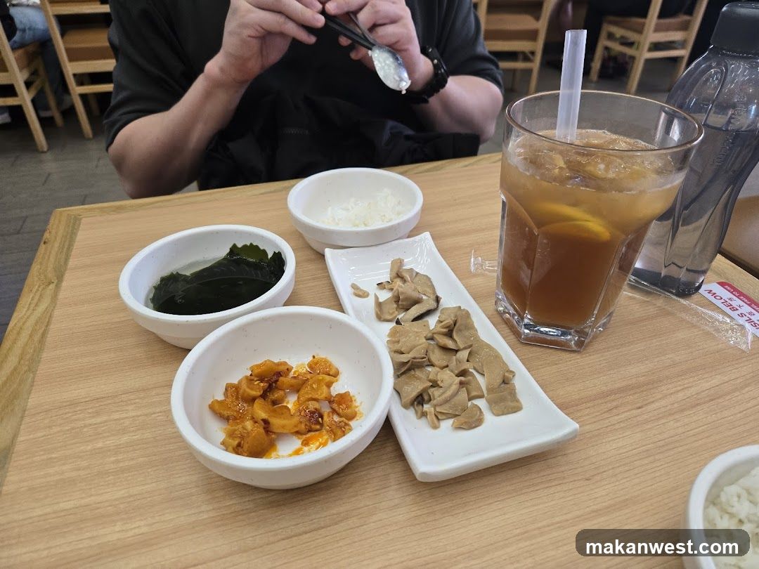 Dining Table with Side Dishes and Drink
