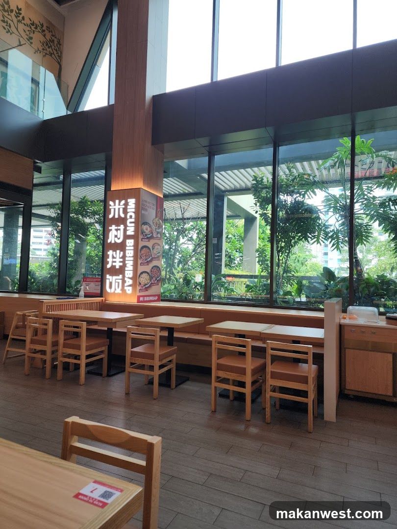 Restaurant Interior with Wooden Seating and Large Windows