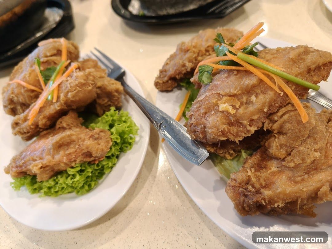 Fried Chicken Wings with Carrot Garnish