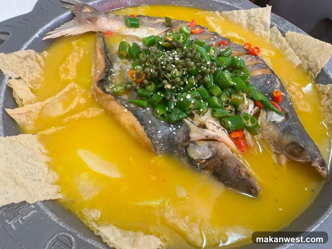 Spicy Fish Dish with Peppers and Sesame Seeds