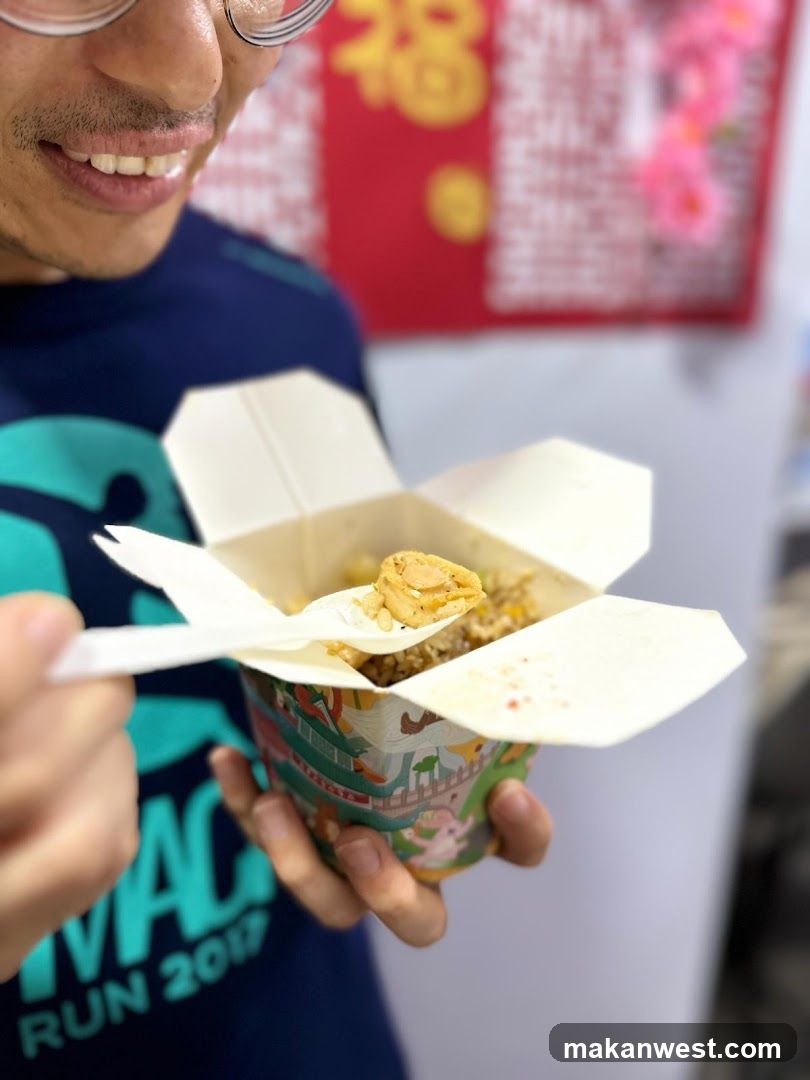 Person holding takeout food container