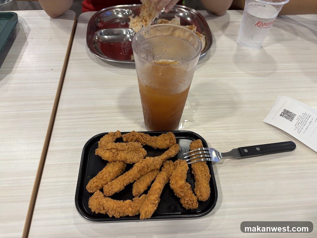 Fried Chicken and Drink at Restaurant Table