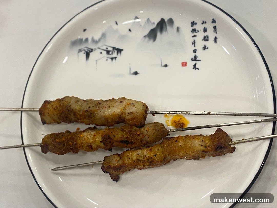 Grilled Meat Skewers on Decorative Plate