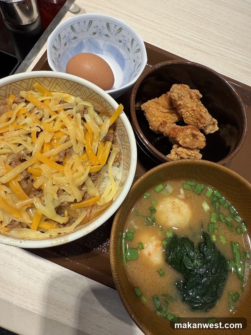 Meal Tray with Fried Rice, Egg, Chicken Wings and Soup