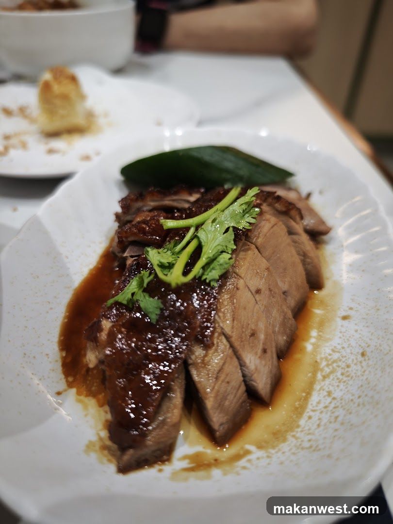Sliced Roasted Duck with Sauce and Garnish