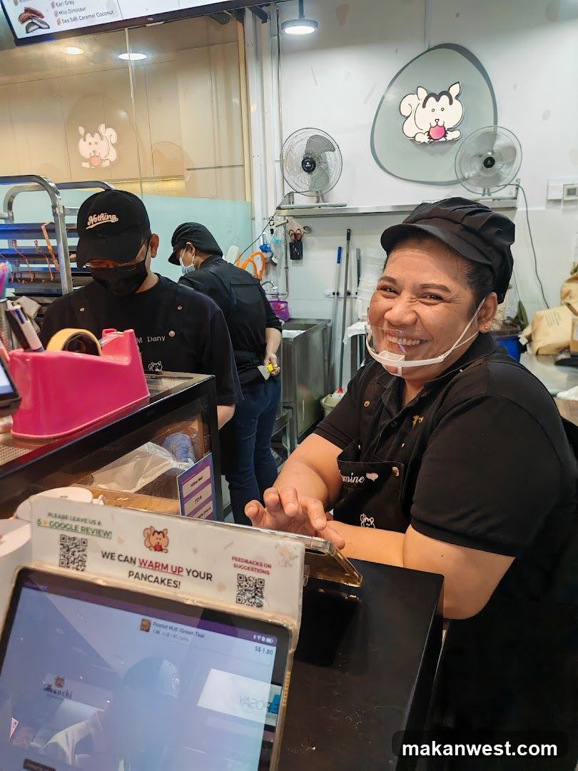 Staff at a food stall counter