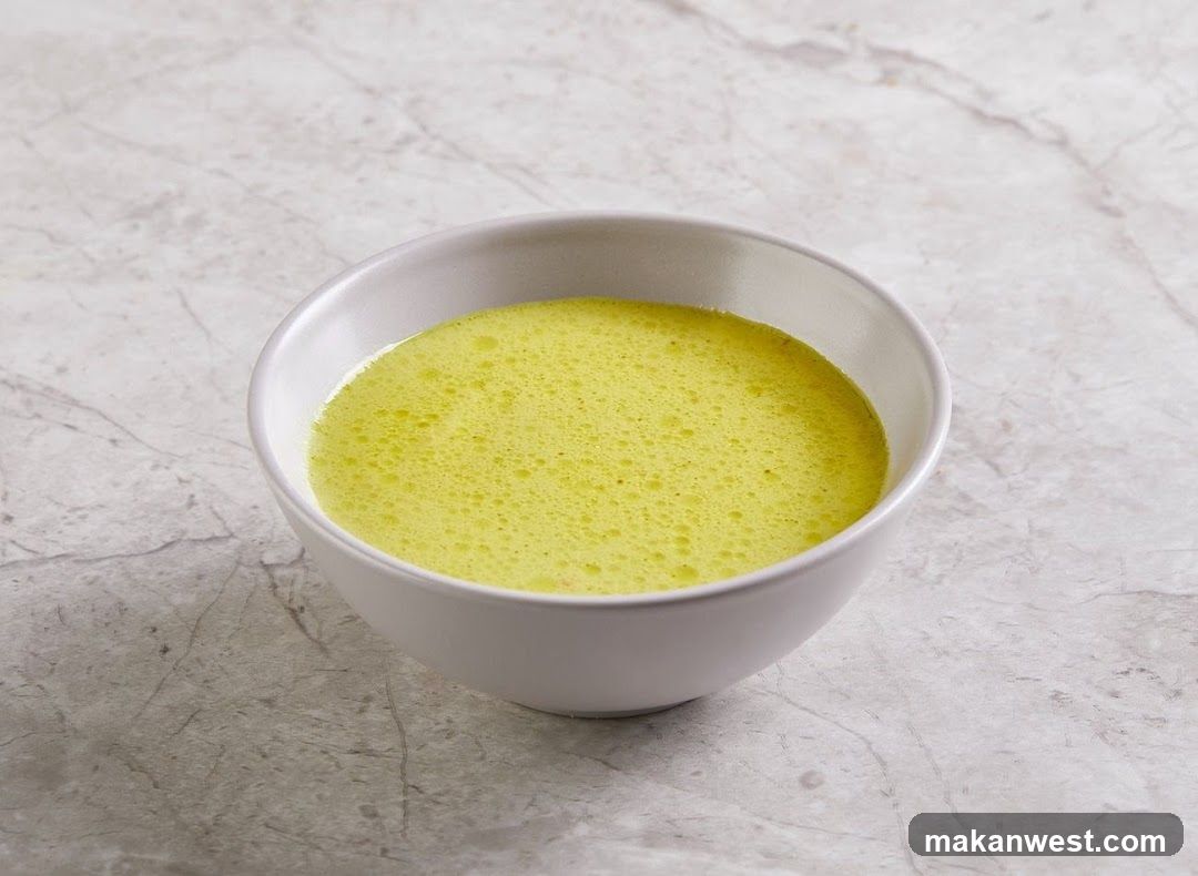 Bowl of Yellow Soup or Broth